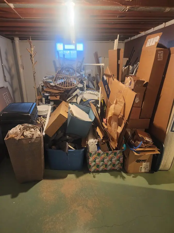 Roll-off dumpster container at job site for 8 Yard Dumpster Rental in Everman